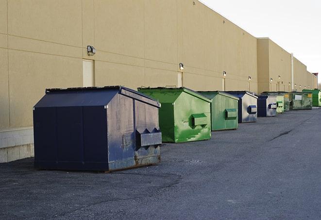 brightly colored dumpsters filled with construction waste in Cedar Hills